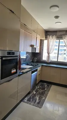 a kitchen with a stove and a stove top oven at Marina casablanca in Casablanca