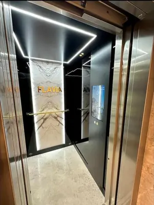 a elevator in a building with two signs on it at Prestigieux Studio- Vue dégagée in Casablanca