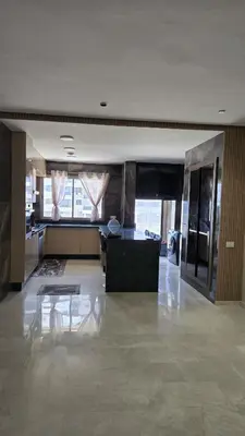 a living room with a couch and a table at Casablanca marina in Casablanca