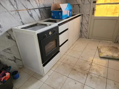 a kitchen with an oven and a counter top at assil hay mohamadi in Casablanca