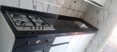 a black stove top oven in a kitchen at assil hay mohamadi in Casablanca