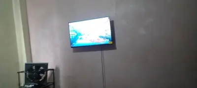 a flat screen tv hanging on a wall at Studio meublée free in Casablanca