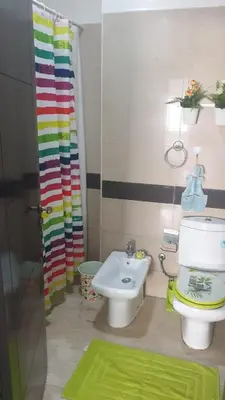 a bathroom with a toilet and a sink and a shower at Studio meublée free in Casablanca