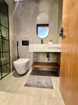 a bathroom with a sink and a toilet and a mirror at Studio prague in Casablanca