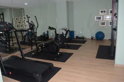 a gym with several treadmills and exercise bikes at Studio Meuble a 5 min de l'aéroport Casablanca in Nouaceur