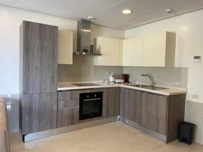 a kitchen with a sink and a dishwasher at Charming Seaview Apartment 4 in Casablanca