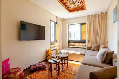 a living room with a couch and a flat screen tv at New! Appartement les pieds dans l'eau WELCOME STAY in Pont Blondin