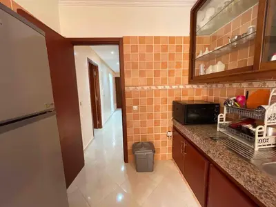 a kitchen with a sink and a counter top at Spacious & Comfy Moroccan Apartment in Temara
