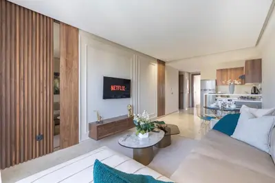 a living room with a couch and a table at Beautiful 1 Bedroom Appartment in Anfa in Casablanca