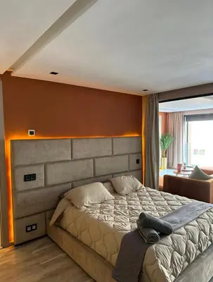 a bedroom with a large bed in a room at Estay in Casablanca