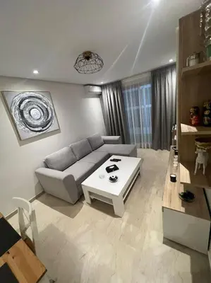 a living room with a couch and a coffee table at Perfect Studio in Casablanca City Center in Casablanca