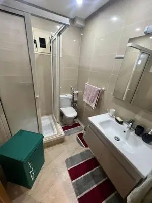 a bathroom with a sink and a toilet and a shower at Perfect Studio in Casablanca City Center in Casablanca