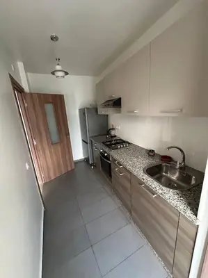 a kitchen with a sink and a counter top at Loft Moderne Cosy avec Terrasse vue unique centre de Casablanca in Casablanca