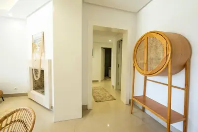 a room with a bunk bed and a hallway at Ocean Pearl - Exclusive 2BR Oceanfront Luxury & Views in Bouznika