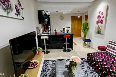 a living room with a couch and a table at Turner Vision in Casablanca