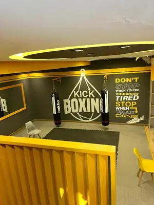 a room with a stage with two bottles of beer on the wall at Sea view apartment in Casablanca