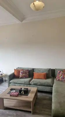 a living room with a couch and a coffee table at Welcome to km 0 of Casablanca in Casablanca
