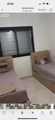 a picture of two beds in a room at Oasis beach in Mohammedia