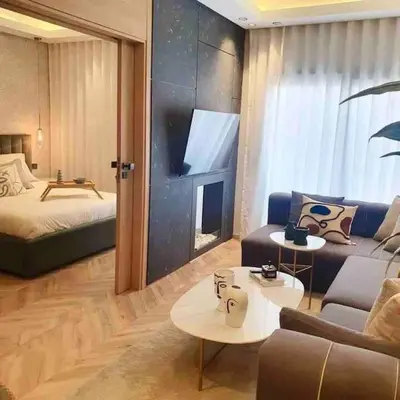 a living room with a bed and a couch at Downtown Luxury Stay CIL in Casablanca