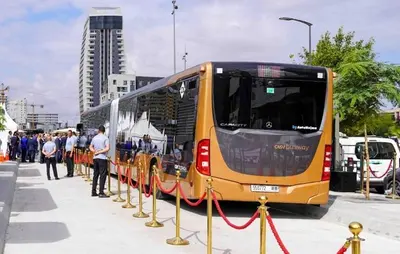 a group of people standing next to a bus at Downtown Luxury Stay CIL in Casablanca