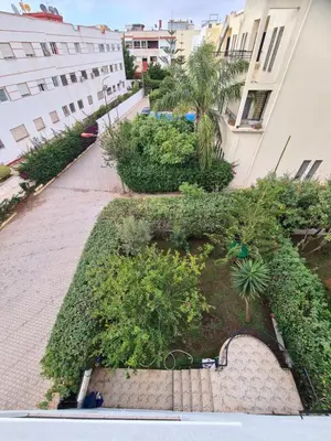an aerial view of a garden in the middle of a building at Belle maison à Harhoura proche de la plage in Rabat