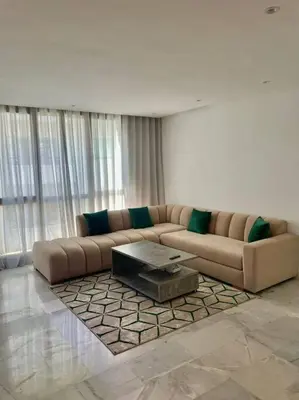a living room with a couch and a coffee table at Casablanca in Casablanca