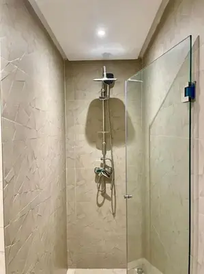 a shower in a bathroom with a glass shower stall at Casablanca in Casablanca