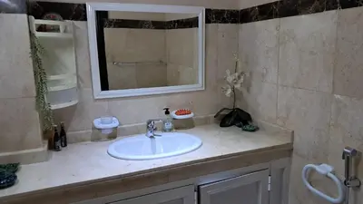 a bathroom with a white sink and a mirror at ANFA BLANCa in Casablanca
