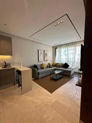 a living room with a couch and a table at Studio Anfa Living 1 in Casablanca