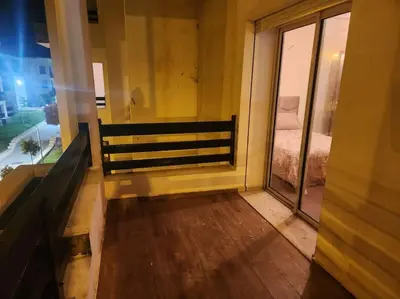 a room with a window with a bed in it at Apartment Ocean View 2Br in Casablanca