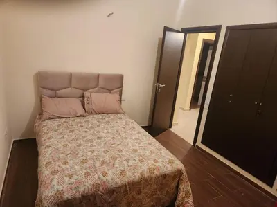 a small bedroom with a bed in a room at Apartment Ocean View 2Br in Casablanca