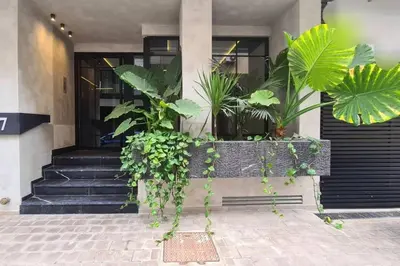 a building with plants on the front of it at Studio Raffiné en Plein Gauthier in Casablanca