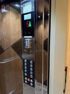 a vending machine with a clock on it at Chic studio à Maarif, near CFC in Casablanca