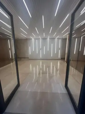 a large room with a white floor and a large window at Perfect stay at CFC near Aeria Mall in Casablanca