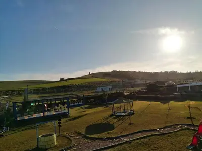 a park with a playground with a swing at Espace happy village settat in Settat