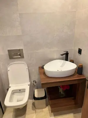 a bathroom with a white sink and a toilet at 35 Appartement ensoleillé calme et NEUF in Casablanca