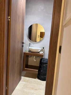 a bathroom with a sink and a mirror at 38 Studio luxueux- Corniche à 5 min in Casablanca