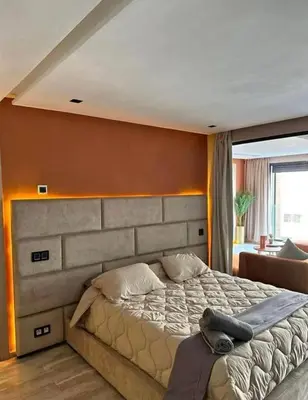 a bedroom with a large bed in a room at المعاريف in Casablanca