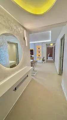 a hallway with a mirror on the wall at N8 appartement, 3 Chambres Haut de Gamme, a Deux Pas de l Ocean et du Mall in Rabat