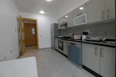 a kitchen with a sink and a counter top at 3BD Appart à 2 min Gare Agdal Luxe & Confort in Rabat