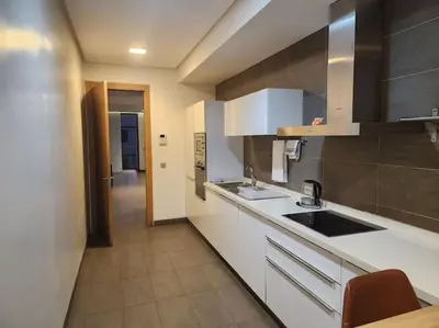 a kitchen with a sink and a counter top at Blue Anfa Place in Casablanca