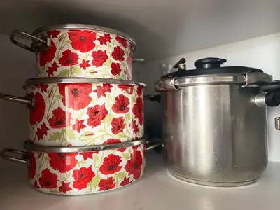 two pots sitting on top of a kitchen counter at Luxury 3 Bedroom Apt Near Park and Sea, Heated Indoor Pool, Wifi, Free Parking in Casablanca