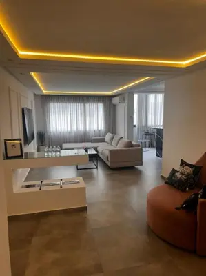 a large living room with a couch and a table at Sunset Lover in Casablanca-Port