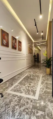 a room with a hallway with a marble floor at Résidence Acacias Casablanca in Casablanca