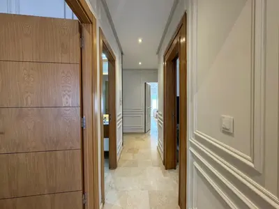 a hallway of a house with a door and a hallway at 3 Bedroom apartment near Highway with parking in Casablanca