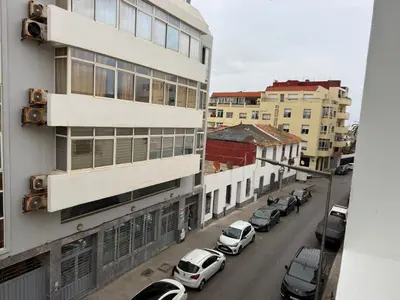 a view of a city street with cars parked at appartement pour les familles , couples mariés bien meublé à Rabat in Rabat