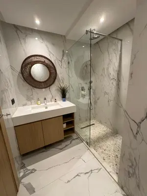 a bathroom with a sink and a shower at Sublime Résidence - Dreamy Appartment 1BR in Maarif