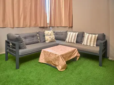 a living room with a couch and a table at Nexthouse in Casablanca
