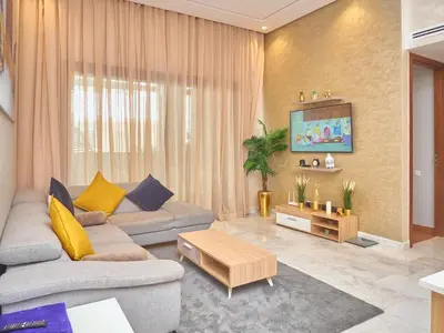 a living room with a couch and a table at Nexthouse in Casablanca