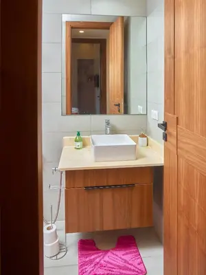 a bathroom with a sink and a mirror at Nexthouse in Casablanca